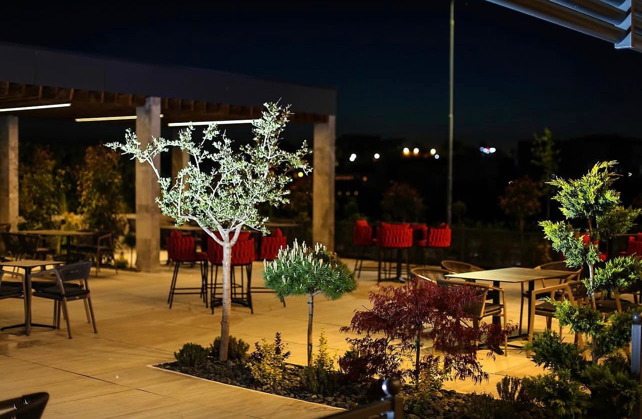Modern Euromiti petrol station canopy at dusk with warm lighting